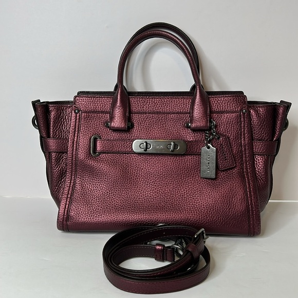 Coach Handbags - Coach Swagger 27 metallic pebble leather double handle satchel.